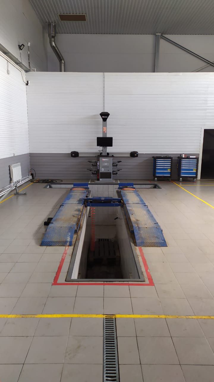 Фото монтаж стенда сход развал 3D 1